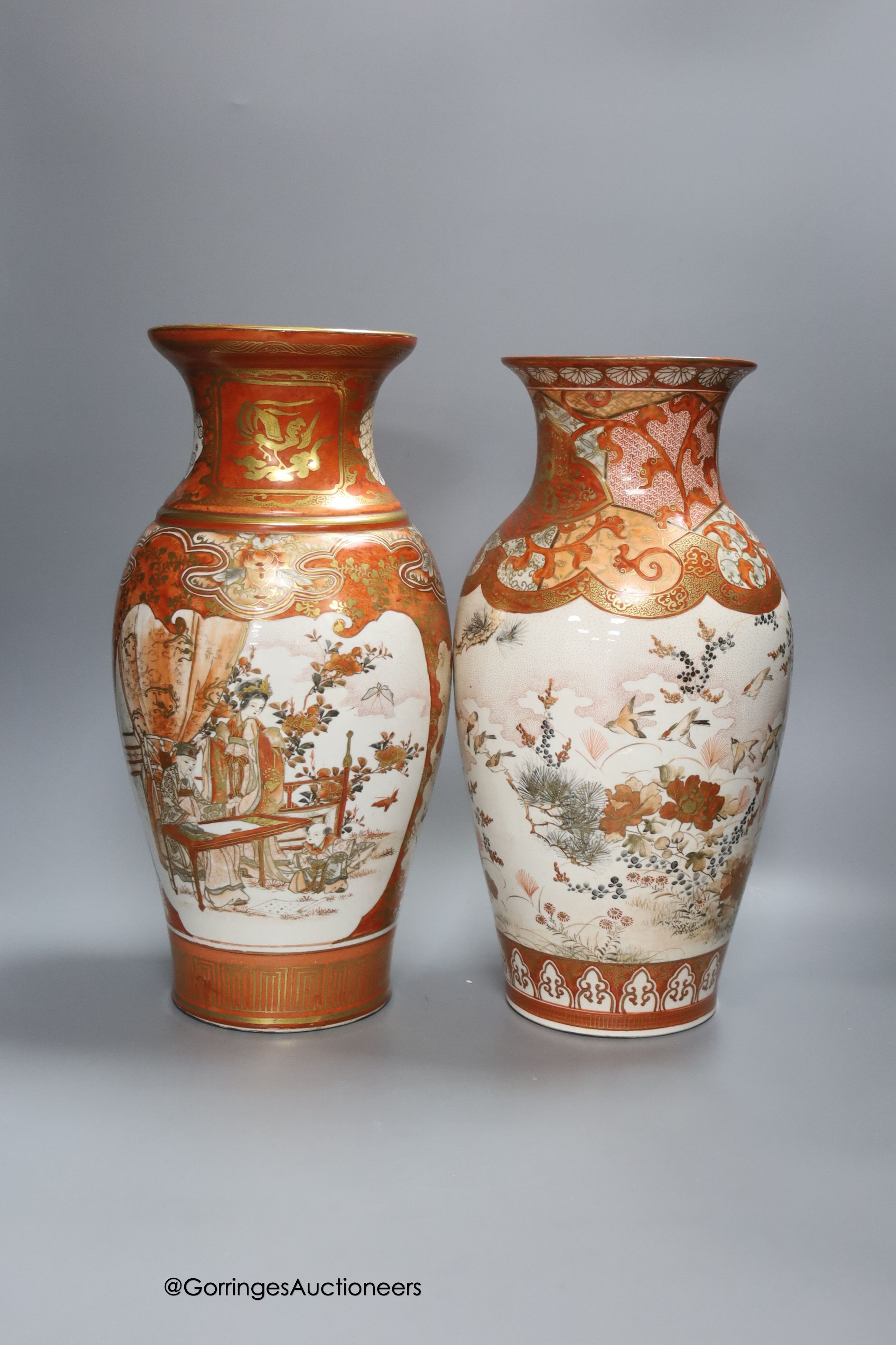 Two Japanese Kutani porcelain baluster vases, tallest 37cm